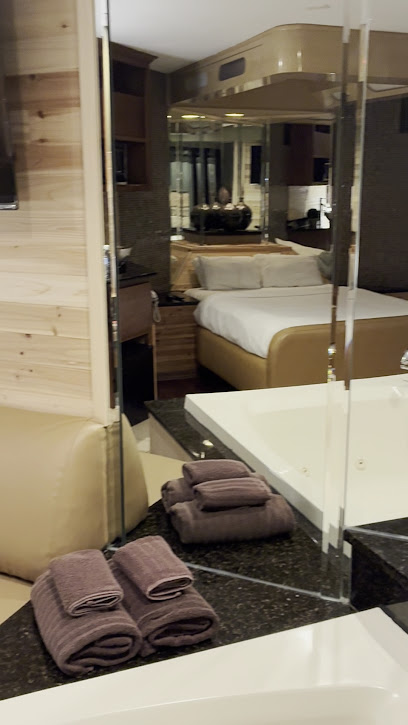 The Champagne Lodge & Luxury Suites Hotels in Orland Park – GayOut Guide